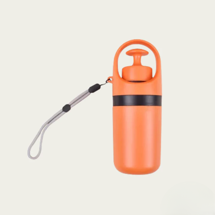 Orange dog poop scooper