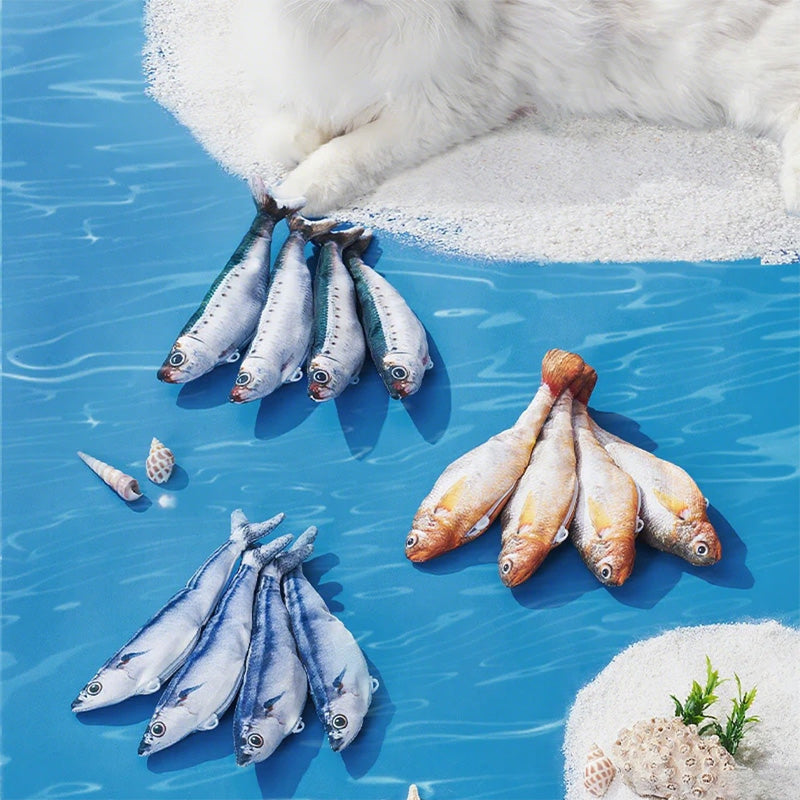 Cat playing with fish toy