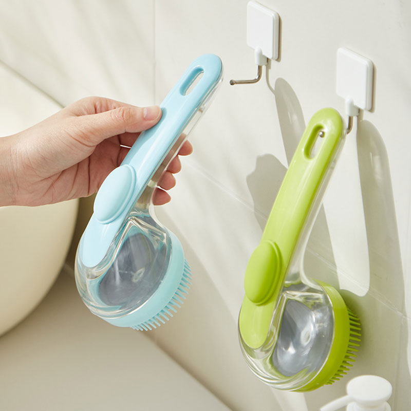 Pet bath brush with built-in shampoo dispenser