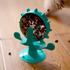 Rotating treat wheel toy in green