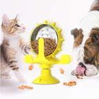 Rotating treat wheel toy in yellow