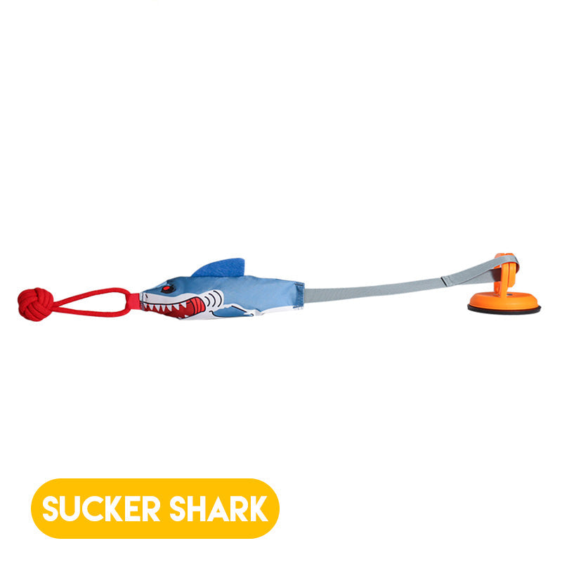 Dog toy with suction cup base