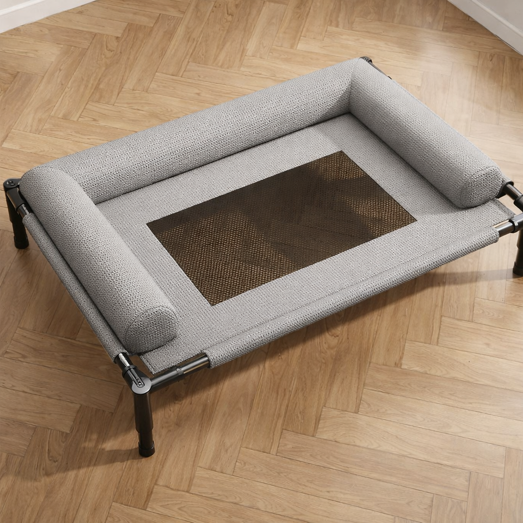 Raised dog bed with breathable woven centre