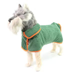 Dog wearing absorbent bathrobe