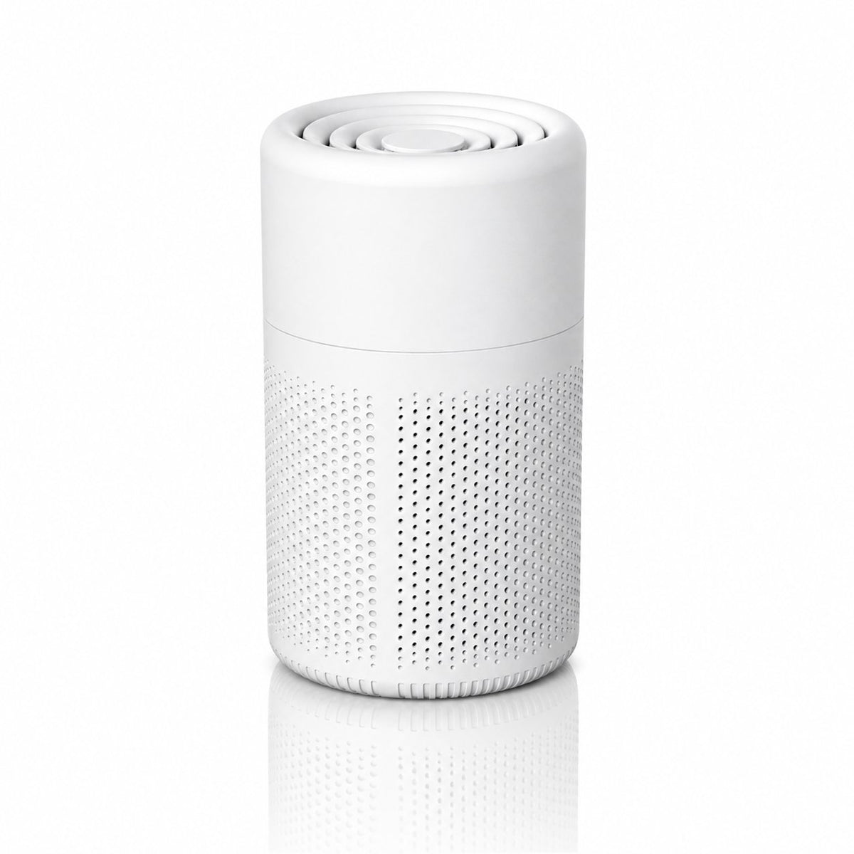 White cylindrical HEPA air purifier with perforated vents, shown beside a sleeping cat at home