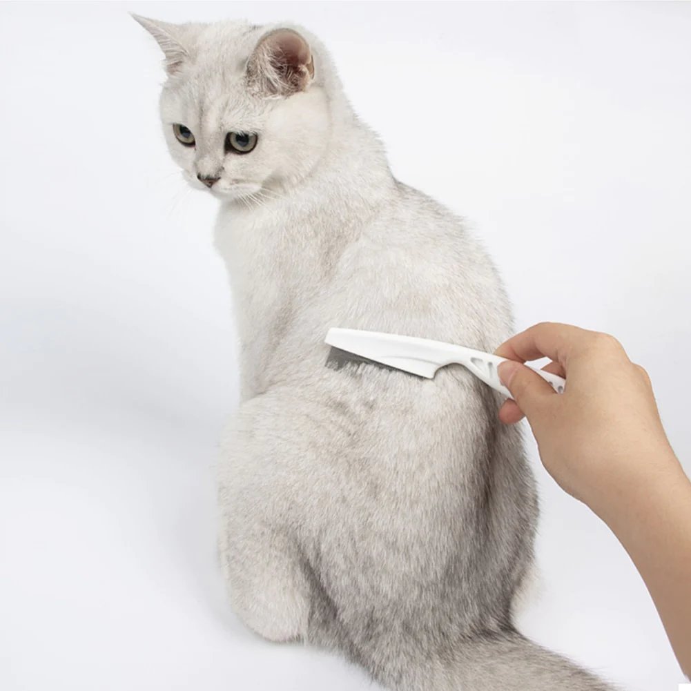 Pet grooming comb in use