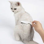 Pet grooming comb in use