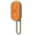 Steam grooming brush for cats – gold-brown and orange