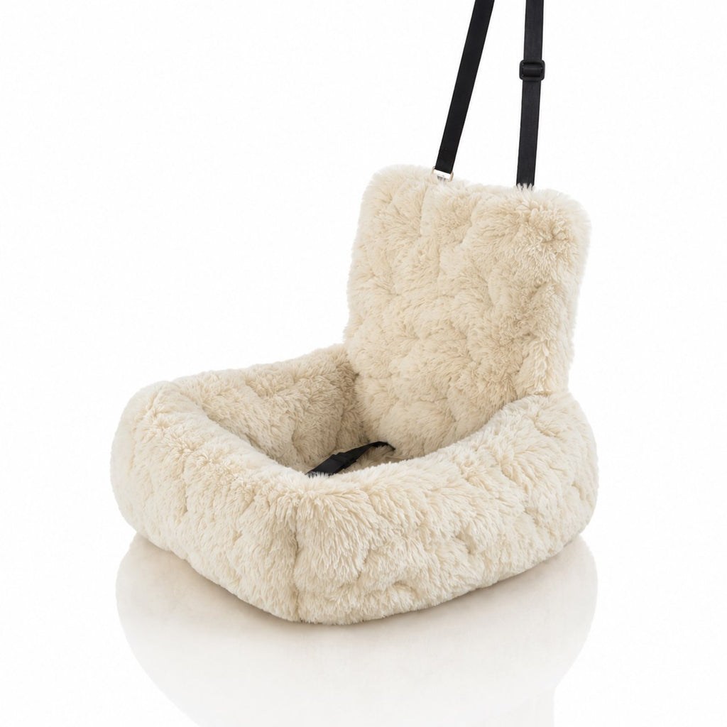 Beige plush dog car seat bed with high backrest, raised sides and black safety strap on car seat (view 2)