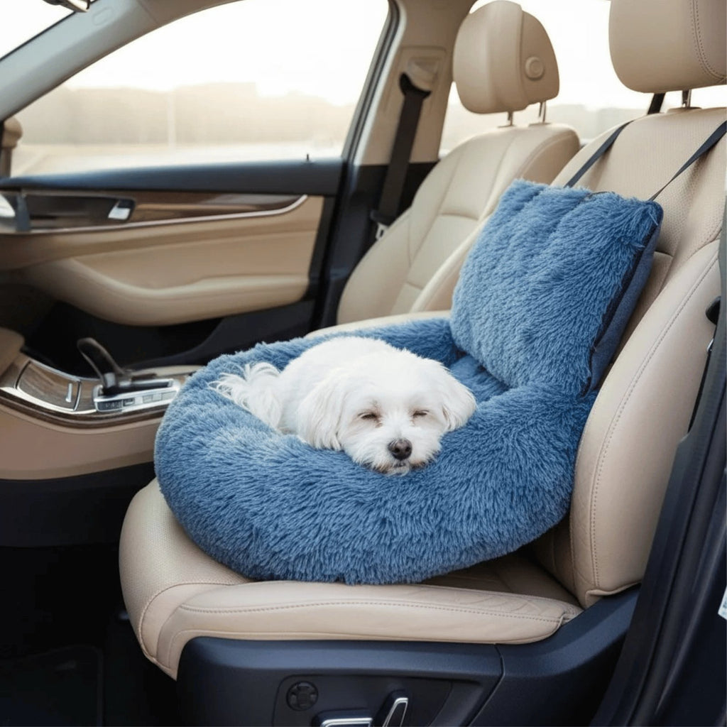 Beige plush dog car seat bed with high backrest, raised sides and black safety strap on car seat (view 4)