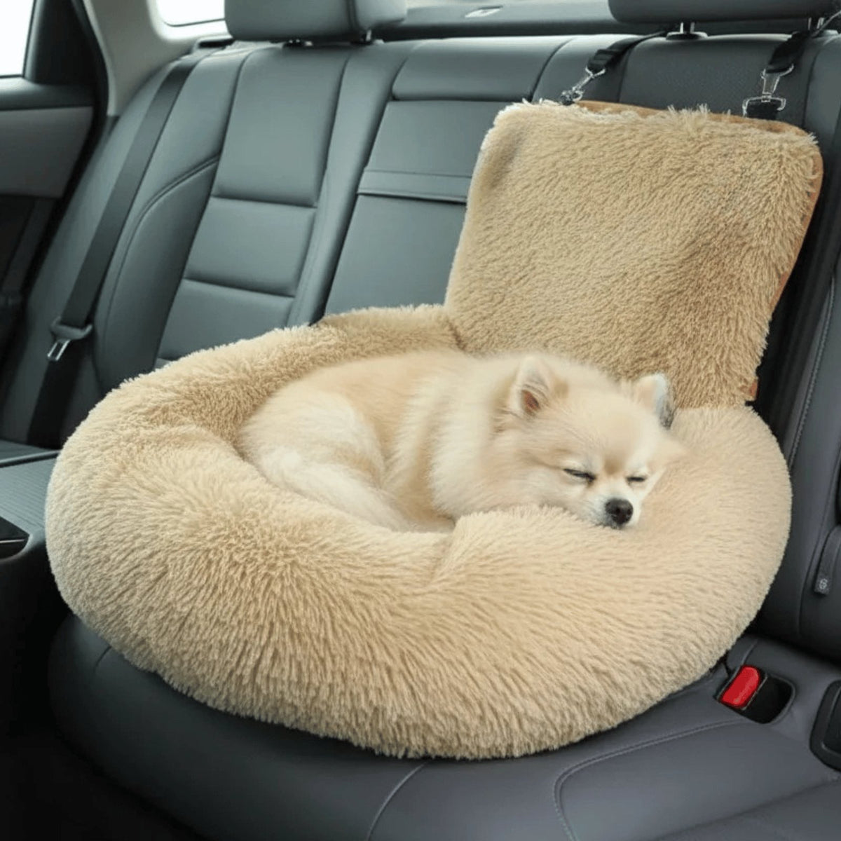 Beige plush dog car seat bed with high backrest, raised sides and black safety strap on car seat (view 5)