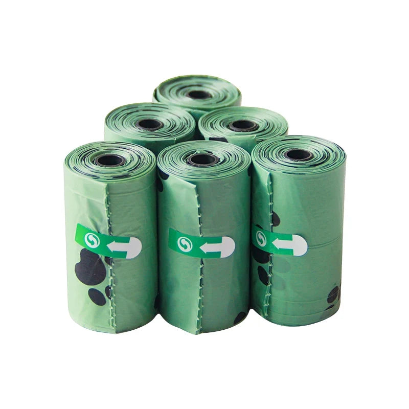 Rolls of green dog waste bags
