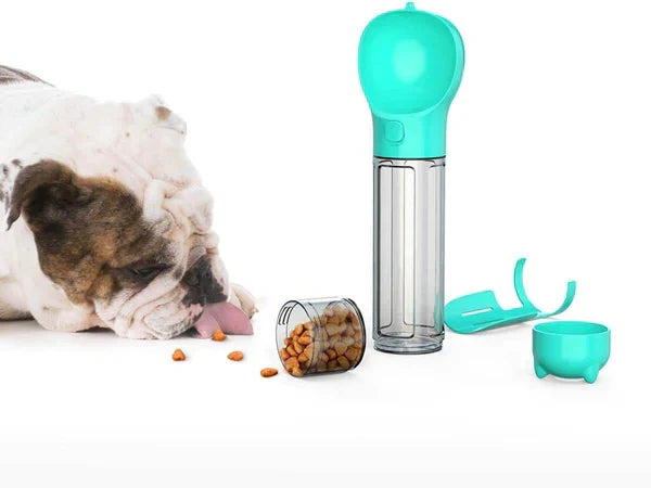 Dog drinking from the portable water bottle