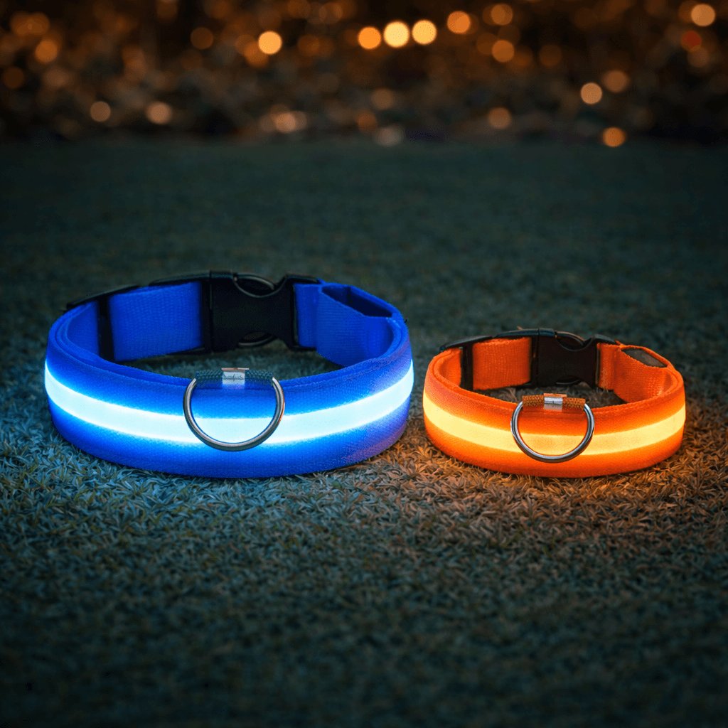 Blue LED dog collar glowing with white light strip, black buckle and metal D-ring on marble surface (view 6)