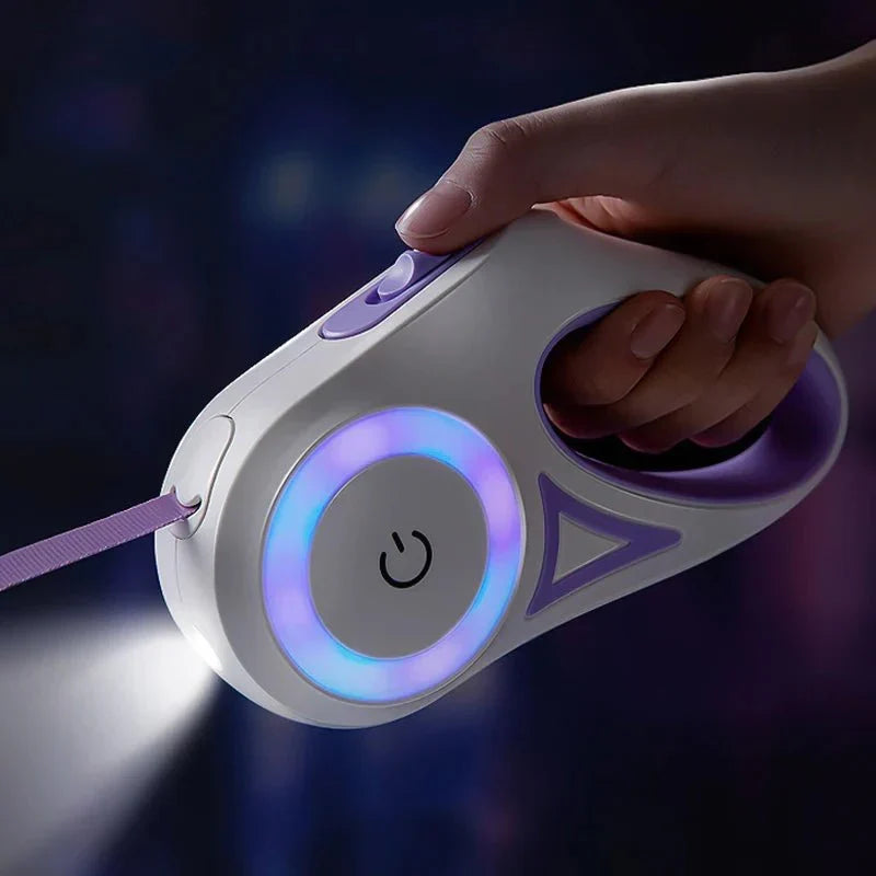Hand holding the LED retractable leash
