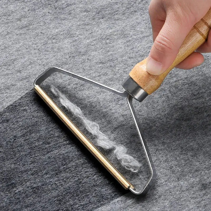 Lint remover on grey fabric