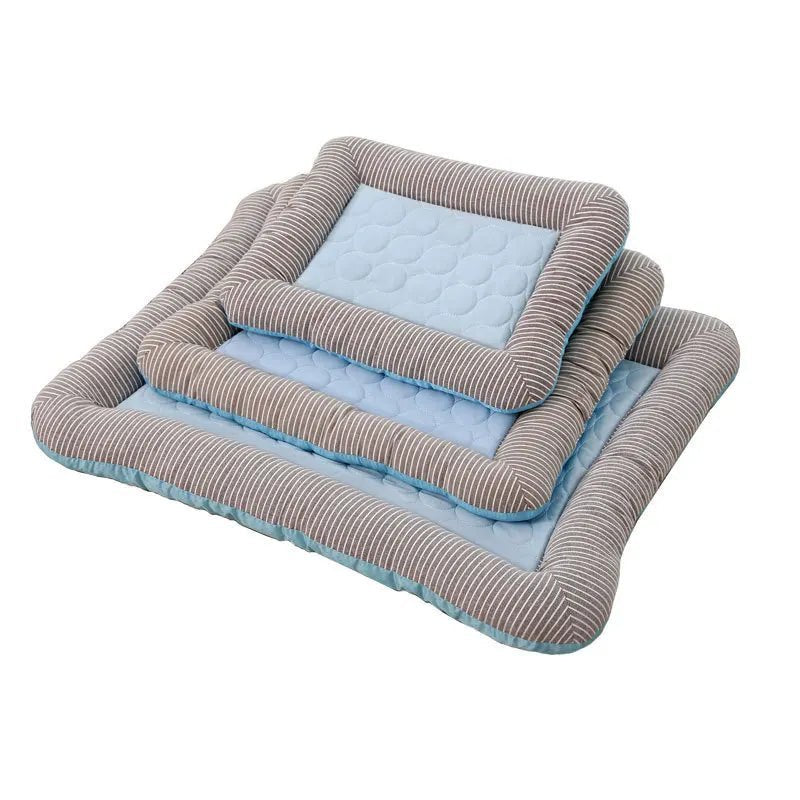 Pink pet cooling mat with striped bolster edges and quilted center, dog resting on it indoors (view 5)