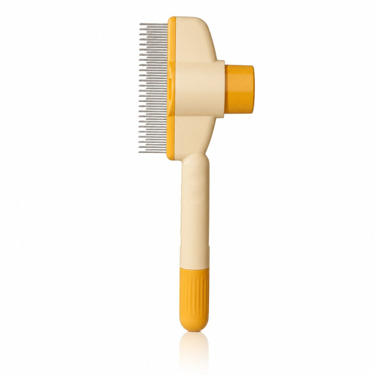 Self-cleaning pet grooming comb with stainless steel teeth and yellow plastic handle held beside a fluffy cat (view 2)